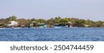 Beach view of Fisherman village Las Penitas entrance to Juan Venado island nature reserve in Nicaragua Central America