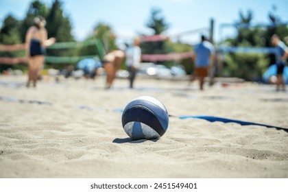 Beach volleyball. The ball on the sand beach. Sport and recreation - Powered by Shutterstock