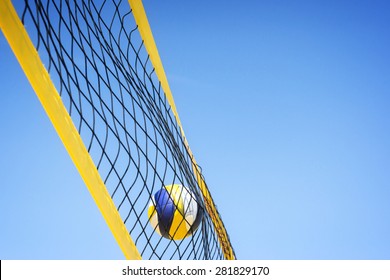 Beach Volleyball Caught In The Net.