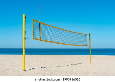 Beach Volleyball Court With An Ocean Background. Summer Sport Concept