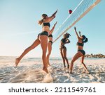 Beach volleyball, friends and women playing in the sand and summer sun. Fitness, diversity and sports on holiday in Brazil, woman team jumping for ball. Volley ball, bikini and a ball game at the sea