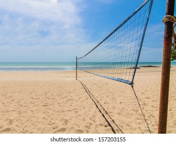 The beach volleyball net on a sunny day with blue sky - Powered by Shutterstock