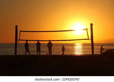 Beach Volleyball Silhouette At Sunset