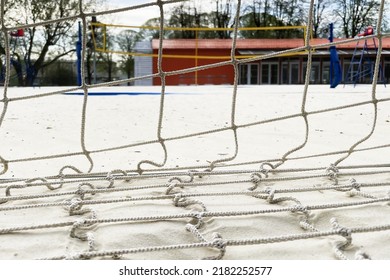 beach volleyball, sports field on the sea coast, hot summer, vacation and holidays