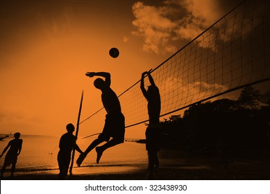 Beach Volleyball at Sunset Enjoyment Concept