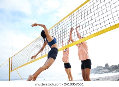 Beach volleyball, woman jump and sport in summer sunshine with friends, team and fitness in low angle. Sports, young women and hands in air, stretching and jumping for exercise, workout and ocean - Powered by Shutterstock