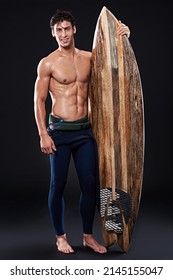 The Beach Is Waiting, Bro. Full Length Studio Shot Of A Young Surfer With A Vintage Board.