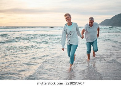 Beach, walking and senior couple holding hands for support, love and care with outdoor wellness, retirement and holiday lifestyle with sunset sky. Elderly people running together in sea ocean water - Powered by Shutterstock