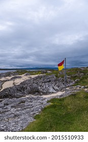 Beach Warning Flag On Coral Strand Beach Galway Ireland