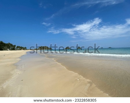 beach waves shore line sunny