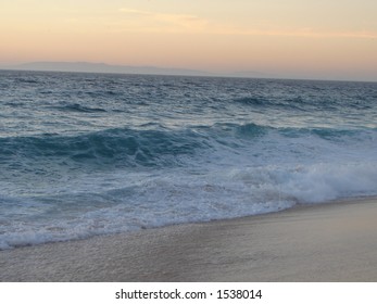 beach waves at sunset - Shutterstock ID 1538014