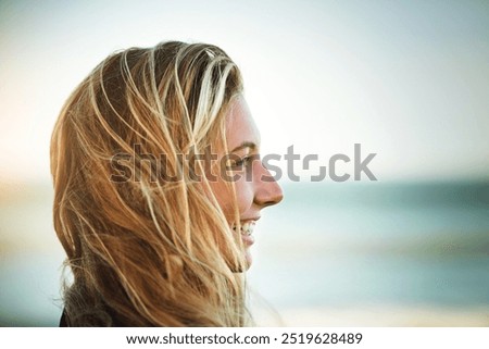 Similar – Portrait of a young woman on the beach