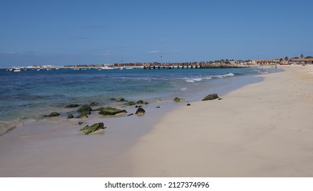 Beach And Wooden Jetty In African Santa Maria Town At Sal Island In Cape Verde, Clear Blue Sky In 2019 Warm Sunny Spring Day On April.