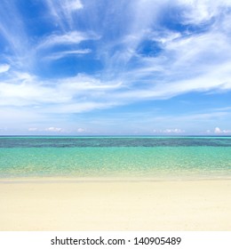 Beaches, crystal clear water, blue sky as background.