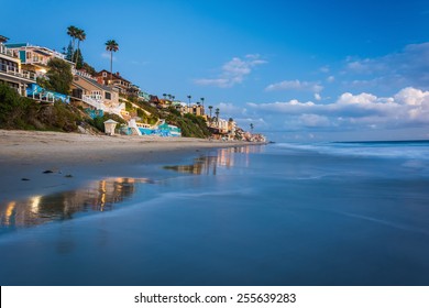 Beachfront Homes At Twilight, In Laguna Beach, California.