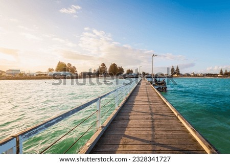 Beachport jetty with fishing boats at sunset, South Australia