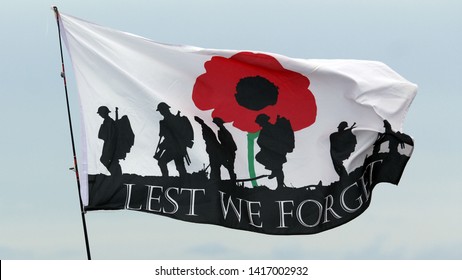 Beachy Head Eastbourne UK June 5th 2019 Lest We Forget Remembrance Flag Flying In The Wind 