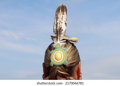 The Bead And Feather Decorations Of An Indigenous Dancer
