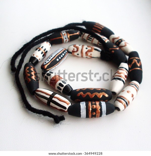 Beads with ethnic
ornaments handmade