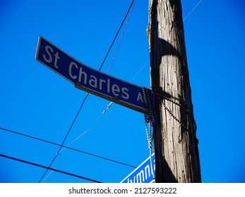 Beads Hanging St. Charles Avenue Street Sign