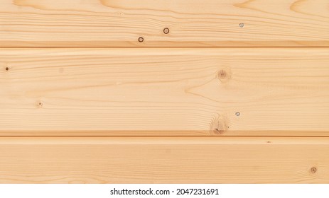 Beam or imitation texture. Wood texture background. Profiled (glued) timber. Decorative cladding board with beveled bevels and a tenon-groove fixation system, with longitudinal ventilation grooves cut
