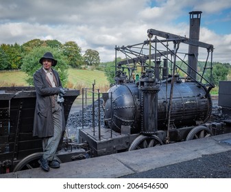 Beamish,Durham,UK, 4 October 2021.  Working Replica Of Puffing Billy Historic Steam Train With Driver In Victorian Period Cotume