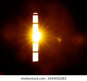 Beams of light in Sapara Monastery, Georgia. Rays of the sun light in the church arch window. Dark and bright sun light rays shining through on wall. - Powered by Shutterstock