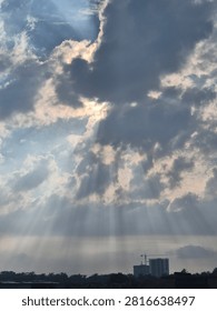 Beams of sun rays piercing through the clouds