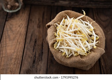 bean sprout in sack on wood food background