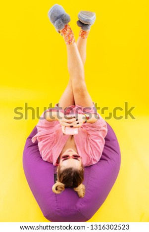 Similar – Woman doing a handstand on the beach