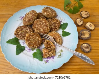 Beans burgers with mushrooms shiitake and oats cooking healthy vegetarian spicy food, spices