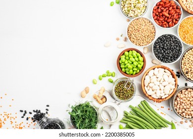 Beans, legumes and green sprouts. Dried, raw and fresh, top view. Red beans, lentils, chickpeas, soybeans. Healthy, nutritious, diet food, vegan protein, micronutrients and fiber sources - Shutterstock ID 2200385005