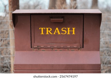 Bear proof trash container at park.  