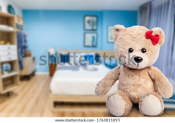 The bear is\
separated from the house\
background.