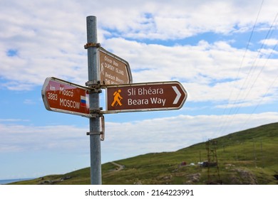 BEARA PENINSULA, IRELAND - JUNE 2022: Sign Post Showing The Start Of The Beara Way, Located In South-west Of Ireland, Right Across Dursey Island, Inhabited By Vikings In The Old Days.