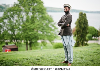 Beard Afghanistan Man Wear Pakol Hat And Jacket.