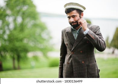 Beard Afghanistan Man Wear Pakol Hat And Jacket.