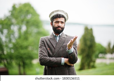 Beard Afghanistan Man Wear Pakol Hat And Jacket.