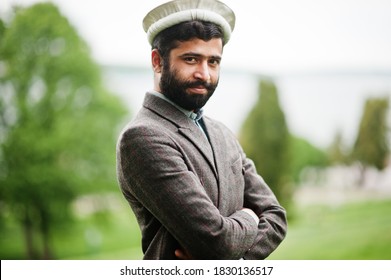 Beard Afghanistan Man Wear Pakol Hat And Jacket.