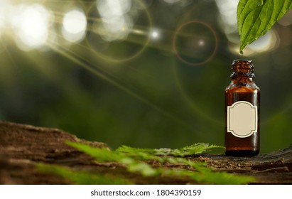 Beard Balm Or Oil On A Green Background. Drops From The Leaf. Blank Label On The Bottles.