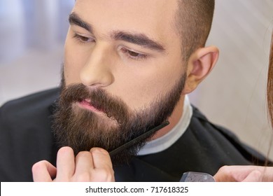 Beard Grooming Close Up. Hand Of Female Barber, Comb.