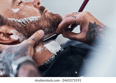 Beard, razor and barber with customer for shave, haircut and grooming for hygiene, wellness or cosmetics. Barbershop, hairdresser parlor and person with shaving cream, foam and blade for hair service - Powered by Shutterstock