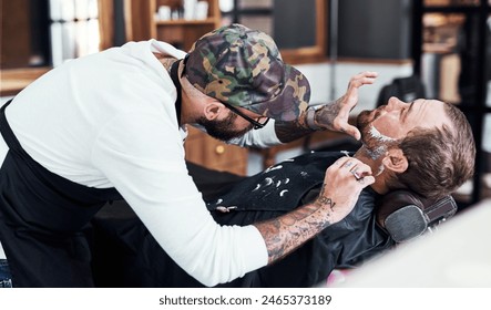 Beard, razor and barber with man for shave, haircut and grooming for hygiene, wellness or cosmetics. Barbershop, hairdresser parlor and person with shaving cream, foam and blade for hair service - Powered by Shutterstock