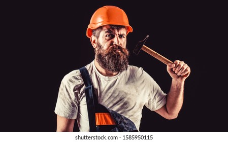 Bearded Builder Isolated On Black Background. Hammer Hammering. Builder In Helmet, Hammer, Handyman, Builders In Hardhat.