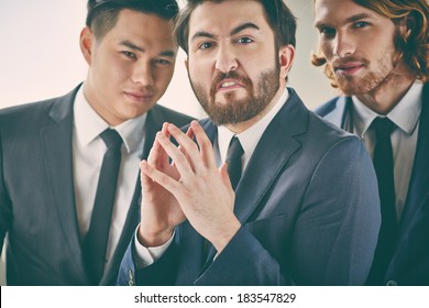 Bearded Businessman With Evil Expression