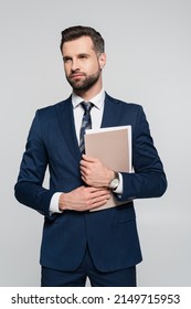 bearded businessman with folder looking away isolated on grey - Shutterstock ID 2149715953