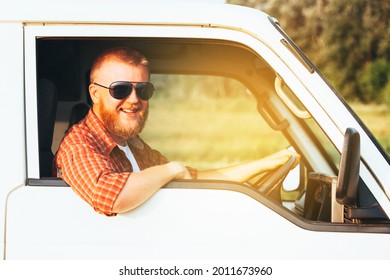 Bearded Cheerful Driver Driving His Camper Van