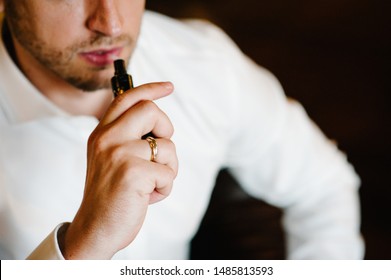 Bearded Guy Smoking Electronic Cigarette To Quit Tobacco. Vape Man. Alternative Nicotine Free Smoking Concept, Closeup.
