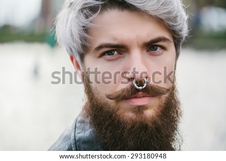 Similar – Man with gray hair and yellow turban.