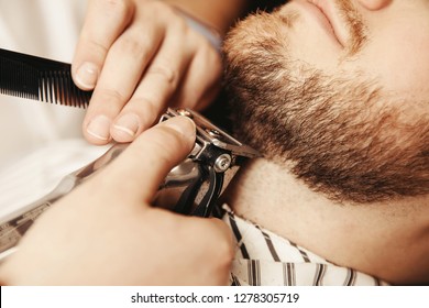 Bearded Hipster Trim Beard In Men Barber Shop Close Up